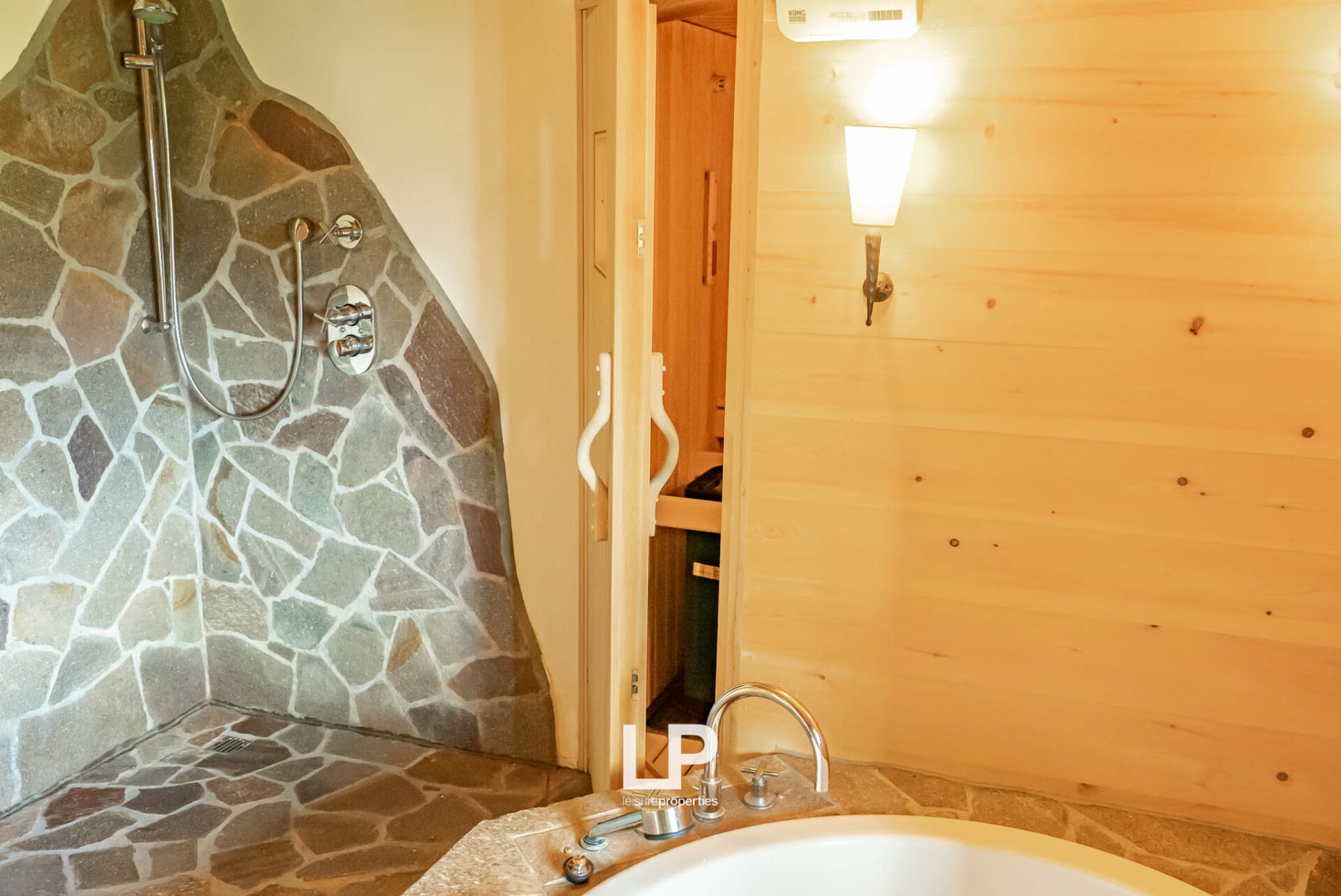 We consider the spa the jewel on the crown; enjoy quality time in the sauna. A deep bath could be used as a cold bath or a relaxing bath with warm water.